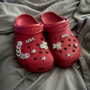 women’s red crocs w/ charms